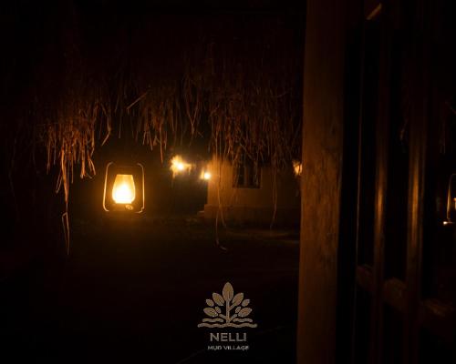 Nelli Mud Village in Tholpetty