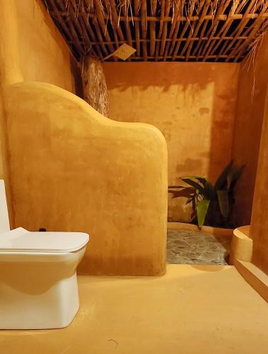 Nelli Mud Village in Tholpetty