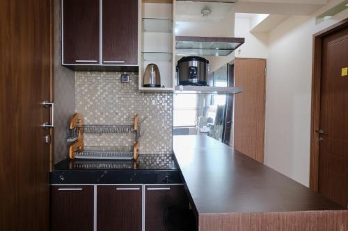 Spacious 3BR Combined Unit at Pinewood Apartment By Travelio Spacious 3BR Combined Unit at Pinewood Apartment By Travelio