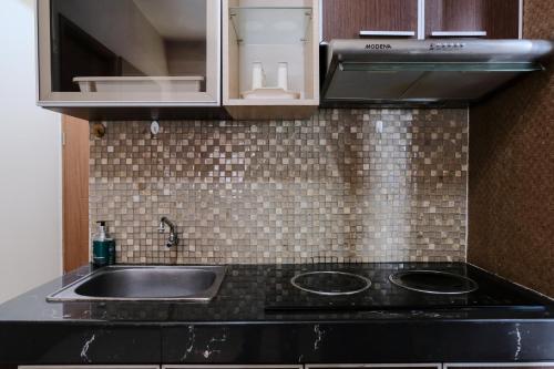 Spacious 3BR Combined Unit at Pinewood Apartment By Travelio Spacious 3BR Combined Unit at Pinewood Apartment By Travelio