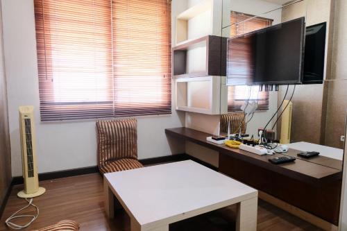 Spacious 3BR Combined Unit at Pinewood Apartment By Travelio Spacious 3BR Combined Unit at Pinewood Apartment By Travelio