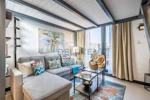Modern Loft-Style Studio at Aria Residence, Jumeirah Village Circle by Deluxe Holiday Homes, Dubai