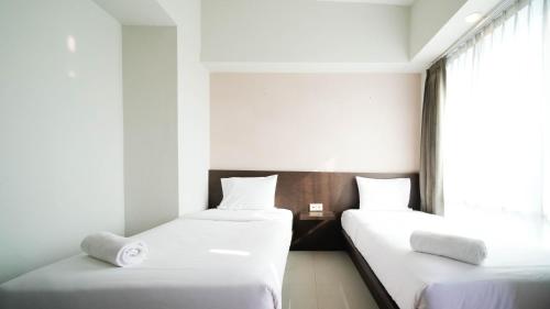 Cozy Stay 2BR at The Square Surabaya Apartment By Travelio – Surabaja, IL