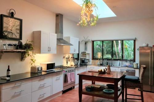 Tropical 2 bedroom home with private pool in New Brighton
