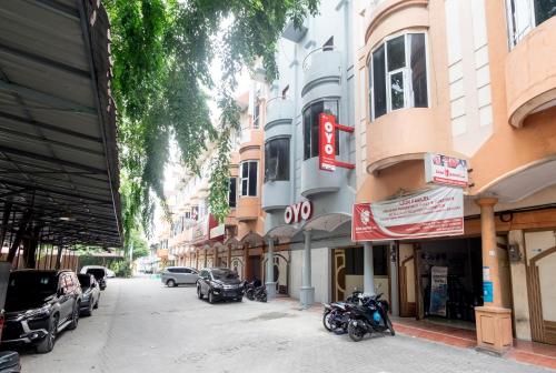 Entrance, Hotel O Metropolitan Homestay Near Komplek Asia Megamas Medan in Medan Kota