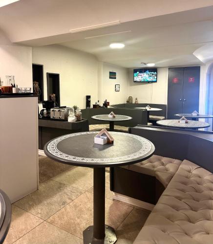 wspólne pomieszczenie/salon TV, hostal malvinas in Ushuaia