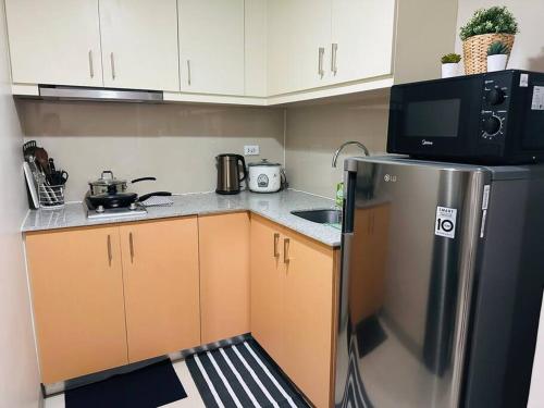 Uptown Bliss-Modern 1BR Condo with Balcony in BGC, Manila (fotografie 6)