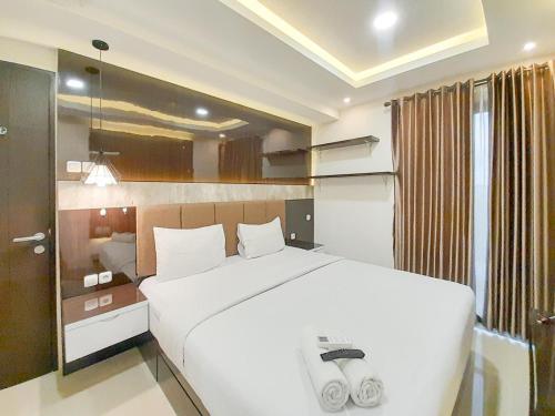 Spacious and Elegant 1BR at Patraland Amarta Apartment By Travelio Spacious and Elegant 1BR at Patraland Amarta Apartment By Travelio