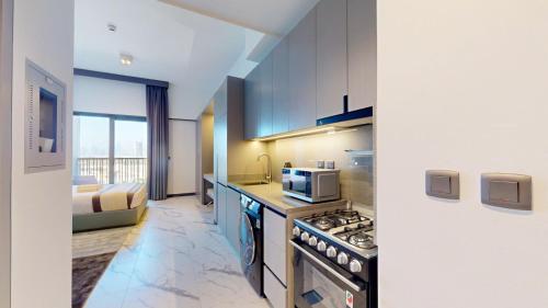 Vacationer Holiday Homes I Calm Studio Apartment l Wi-Fi, Private Balcony & Equipped Kitchen, Dubaj (fotografie 8)