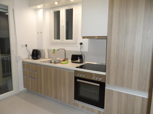 廚房, Laura Deluxe Apartment in 新海灘區