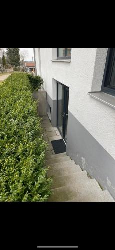 外部景觀, Architect-Apartments 80qm 3 Schlafzimmer, integrierter Kuche und Bad, 2min von A8, Garten mit Sitzgr in 申貝格