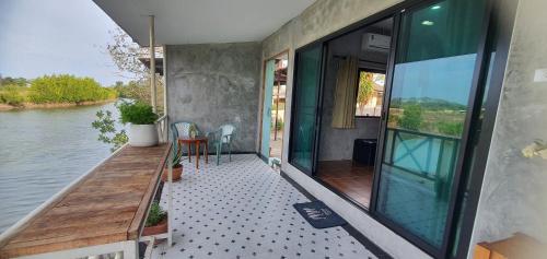 A small house next to the canal A small house next to the canal