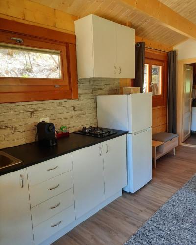 virtuve, Tawa Cove Cabins in Endeavorinleta