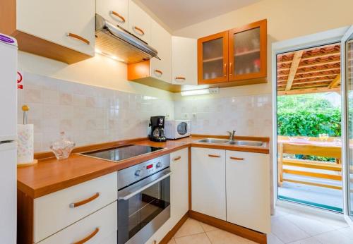 Holiday home Dinko-20m from sea - image 14