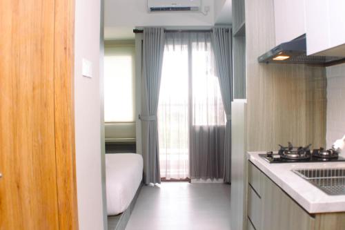 Comfy Studio Apartment at Gateway Park LRT City By Travelio Comfy Studio Apartment at Gateway Park LRT City By Travelio