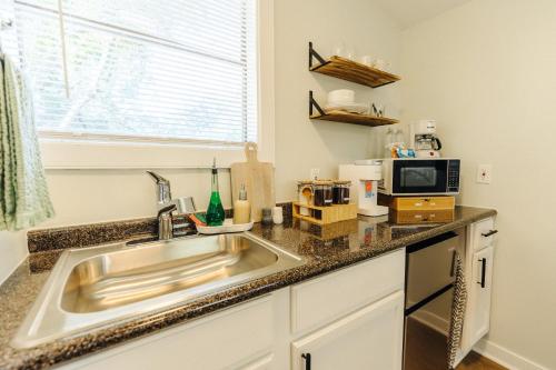 Centrally Located Memphis Tiny Home Queen Bed REAR