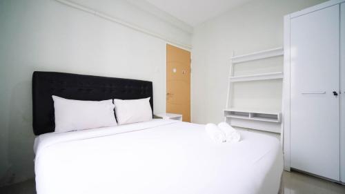 Best Deal and Homey 2BR at Bale Hinggil Apartment By Travelio, Surabaya