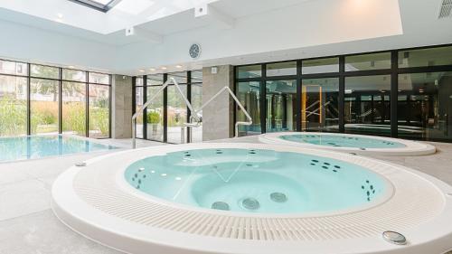 VacationClub - Green Port Resort Apartament 105 in Podczele