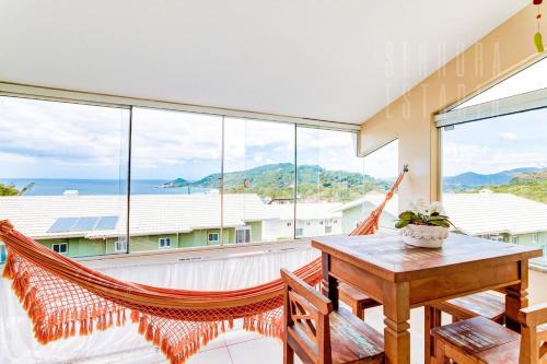 Balcony/terrace, Dragon View Beach House Vista Mar Lagoa Praia Part in Mole Beach