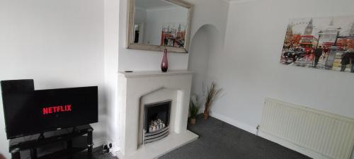 Brackenfield House in Great Barr, Birmingham near Alexander Stadium and near the M6, with free WiFi and free parking and easy access to Walsall, West Bromwich, Aston Villa Football Ground, Star City and Birmingham City Centre, Бирмингем (фото 6)