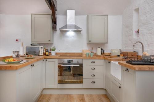 virtuve, Jasmine Cottage in Marldon
