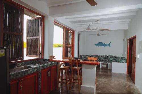 Kitchen, Casa en la Ciénaga Hostal in Rincón