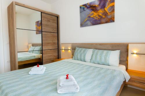 . Harizma apartmani - Maja