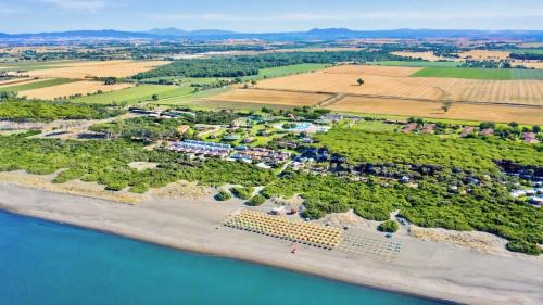 Village with swimming-pool in Montalto Marina just 100 meters from the beach, mobile homes with air conditioning and private outdoor area