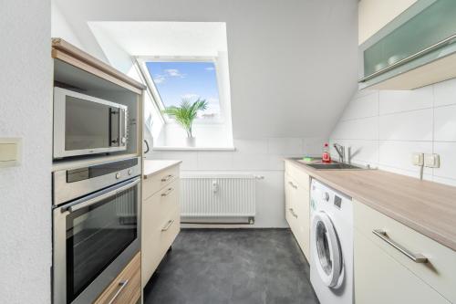 廚房, City Apartments- Work & Stay nahe Hannover in 阿德爾海茨多夫