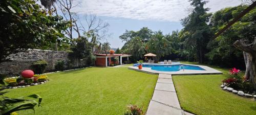 Quinta campestre Amor Secreto. Alojamiento entero en renta in Temixco, Mexico