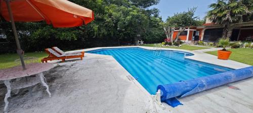 Quinta campestre Amor Secreto. Alojamiento entero en renta in Temixco, Mexico