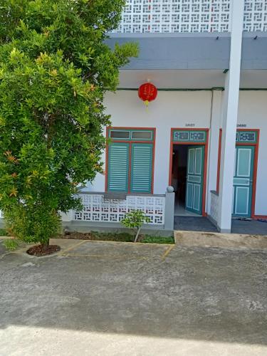 출입구, Tanah merah guest house in 싱카왕