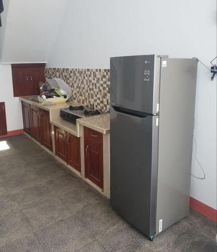 Kitchen, Tanah merah guest house in Singkawang