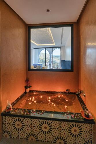 热水浴池, 塔吉谢夫沙万拉克斯瑞霍特尔安德斯帕 (TAJ CHEFCHAOUEN Luxury Hotel and Spa) in 舍夫沙万