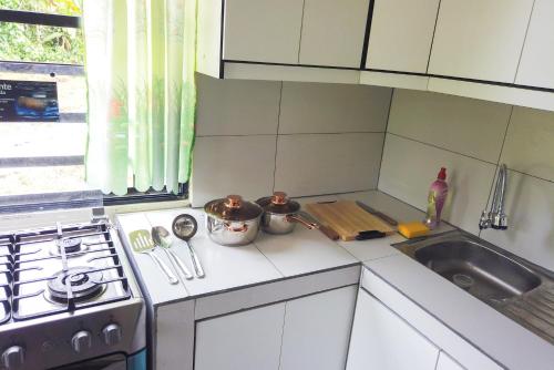 Cocina, Logan's Paradise Vacation Home in Tena