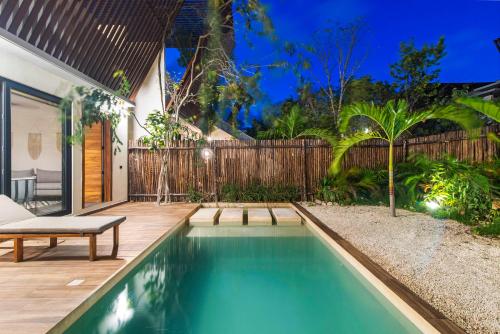 La Veleta Getaway at ASANA LEAF House Sleeps 12 in Tulum, Mexico