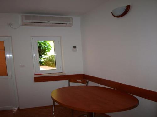 One-Bedroom Apartment with Balcony and Garden View