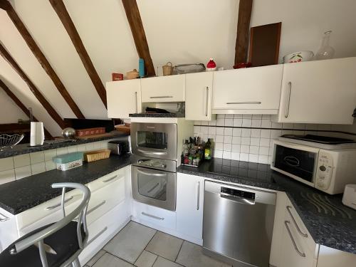 Фасада на хотела, La Charmalex - Grange en Aveyron in Мюр-дьо-Баре