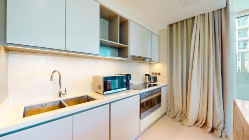 Vacationer Holiday Homes I Lux 3 Bed I Private Beach Access, Emaar Beachfront I Sunrise Bay Tower 2, Dubaj (fotografie 6)