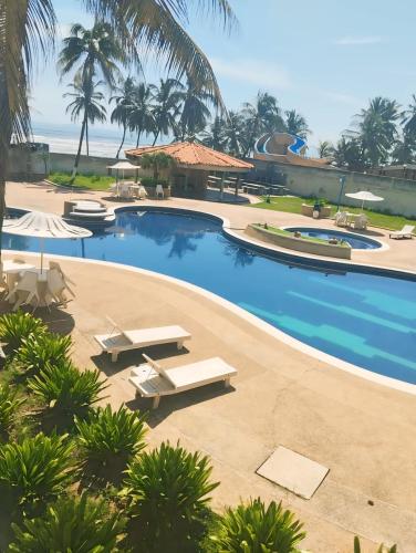 Swimming pool, Apartamento Costa Brava Terraza Privada con Vista al Mar y Piscina in Tucacas