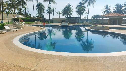 Swimming pool, Apartamento Costa Brava Terraza Privada con Vista al Mar y Piscina in Tucacas