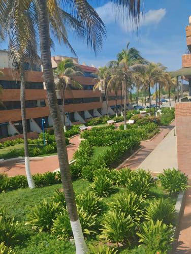 Garden, Apartamento Costa Brava Terraza Privada con Vista al Mar y Piscina in Tucacas