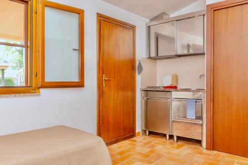 ISA-Village with swimming-pool and private equipped beach in Montalto Marina