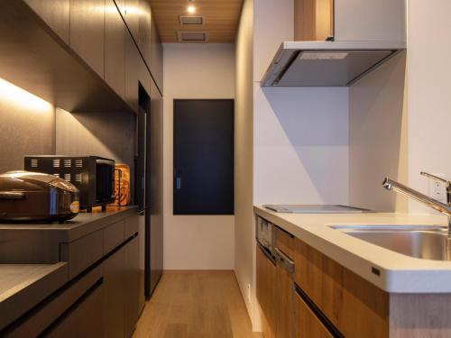 Twin Room with Tatami Area Condo - Non-Smoking image 10
