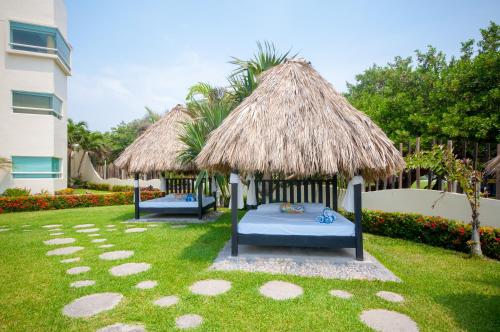 tuin, Artisan Family Hotels and Resort Collection Playa Esmeralda in Playa de Chachalacas