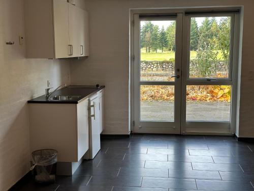 keuken, Tollundgaard Golf Park & Apartments in Silkeborg