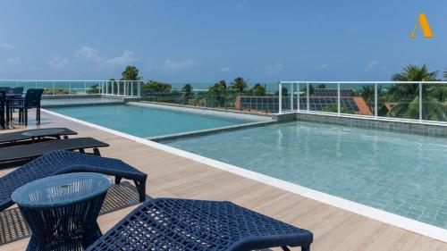 สระว่ายน้ำ, Flat moderno, confortável Praia de Serrambi BFS312 (Flat moderno, confortavel Praia de Serrambi BFS312) in อีโปะจูกา