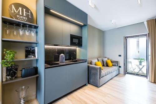 MH SUITES Plebiscito 2