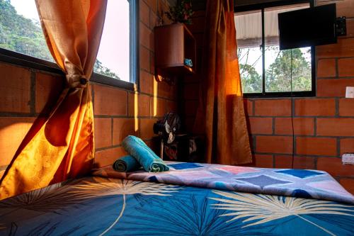 Habitaciones Finca en San Rafael Frente al charco la Cristalina con vista a las montañas