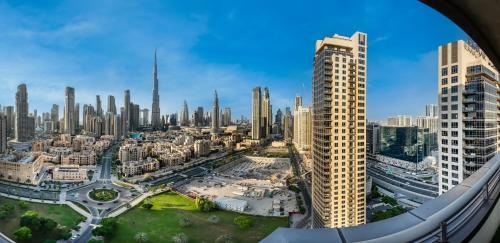 Skyline Serenity Holiday Home I Bespoke 1 Bedroom Apartment I Burj Khalifa & Fountain Views I Free Gym Pool Wi-Fi Parking & PS5 - main image